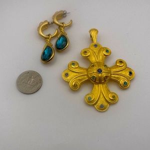 Matte gold tone large cross pendant with aqua colored faux stones and earrings
